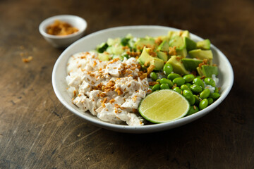 Homemade chicken bowl with avocado