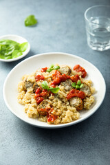 Quinoa with chicken sausage and tomato sauce