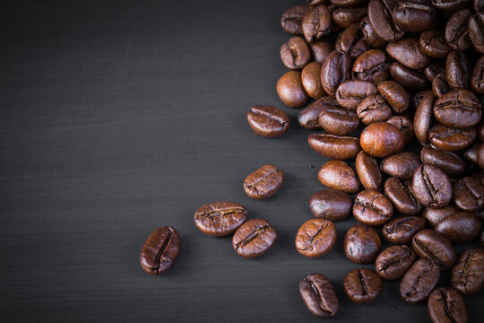 roasted coffee beans for background. Picture copy space for add text.