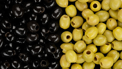 Olives. Black and green olives top view. Pitted olives 