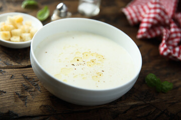 Traditional homemade cheese soup with croutons