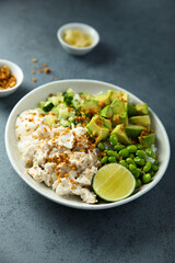 Homemade chicken bowl with avocado