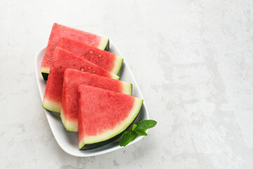 Fresh ripe watermelon slice served on plate. Space for text
