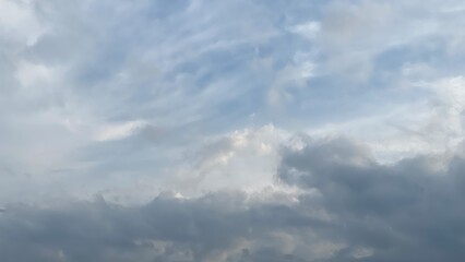 5pm clouds at Kawaguchiko lake, the beautiful cotton candy clouds seem to gather to shape the triangle head of Mt. Fuji, hiding the real “Fujisan” in the back, Yamanashi prefecture year 2022 August 26