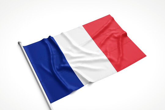 French Flag is Laying on a White Surface