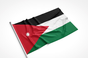 Jordan Flag is Laying on a White Surface