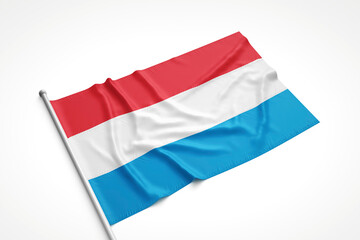 Luxembourg Flag is Laying on a White Surface