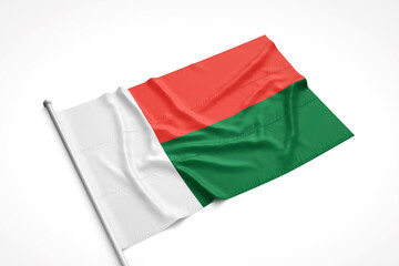 Madagascar Flag is Laying on a White Surface