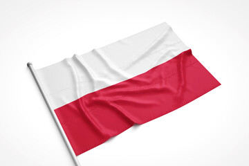 Poland Flag is Laying on a White Surface