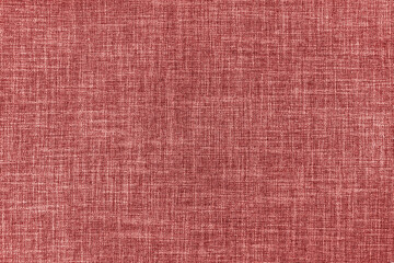 Fototapeta na wymiar Texture of natural red upholstery fabric or cloth. Fabric texture of natural cotton or linen textile material. Red canvas background. Decorative fabric for curtain, furniture, walls, clothes
