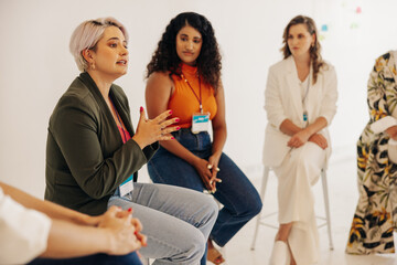 Creative businesswomen having a discussion during a conference meeting