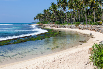 Coral reef in the Indian Ocean. Entrance to the surf spot. Polhena