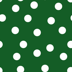 White polka dots on a green background seamless pattern