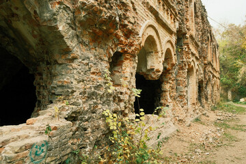 Naklejka premium Ruins of Tarakaniv fortress - Tarakaniv village, Dubno district of Rivne Oblast, Ukraine. Abandoned Military Tarakaniv Fort, Dubno Fort.