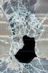 Broken glass by vandals in a shop