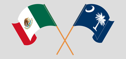 Crossed and waving flags of Mexico and The State of South Carolina