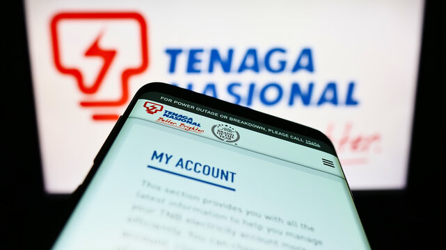Stuttgart, Germany - 08-28-2022: Smartphone with webpage of Malaysian company Tenaga Nasional Berhad (TNB) on screen in front of business logo. Focus on top-left of phone display.