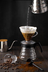 Barista hand dripping brewed coffee