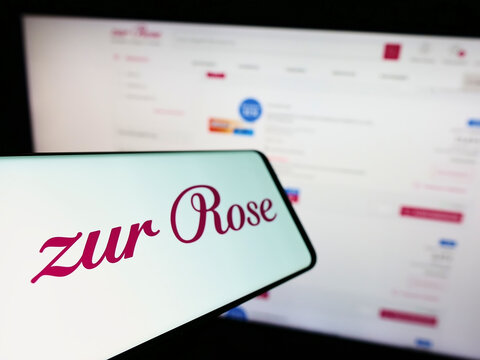 Stuttgart, Germany - 08-28-2022: Cellphone with logo of Swiss pharmacy company Zur Rose Group AG on screen in front of business website. Focus on left of phone display.