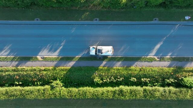 Road Sweeper Cleaning the Streets in the UK Aerial View