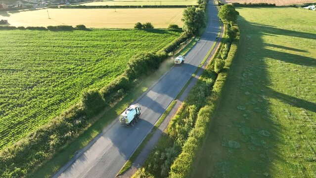 Road Sweepers Preparing a Street for Resurfacing