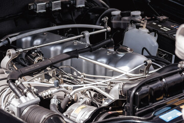 Perfect clean vintage old engine looks like brand new. Clean engine bay. Car cleaning and car detailing concept.