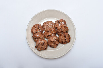A dish of delicious-looking marinated mashed meat on a plate