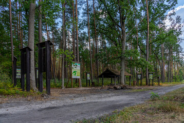 Resting place in the forest with educational boards