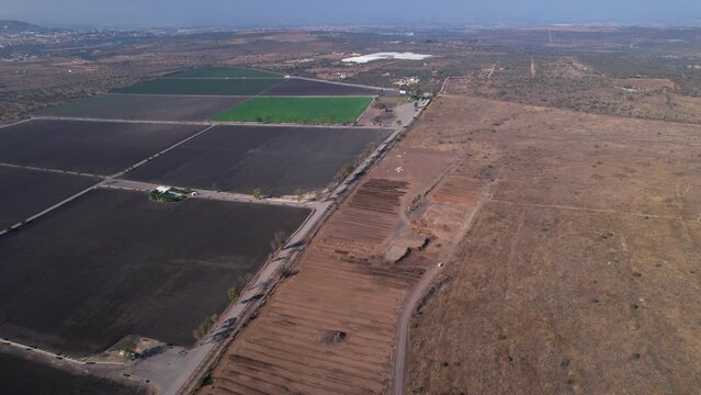 high aerial shot of compost farm land in mexico