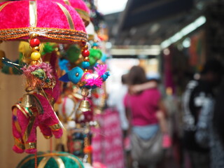 Colourful trinkets hanging for sale in Little India, Singapore