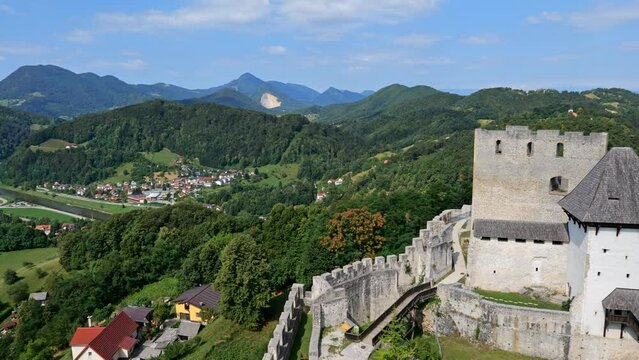 Landscape with medieval Celje Castle and Celje city in Slovenia, Lower Savinja Valley, panning to the right.