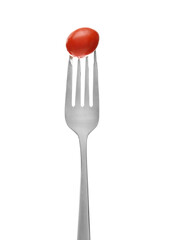 Fresh cherry tomato on fork over white background
