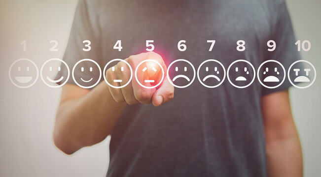 man touching sad of pain scale icons virtual screen interface, medical technology and futuristic concept.