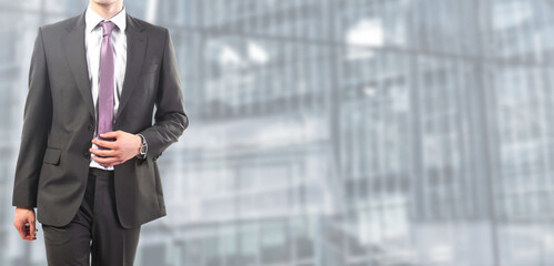 businessman works  at the office - People isolated on modern office background - banner
