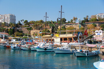 various pleasure boats and yachts in the seaport of the Mediterranean sea