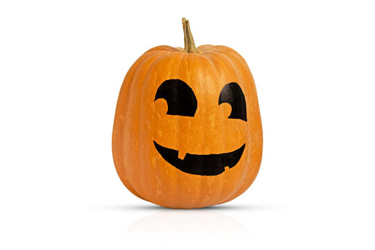Orange pumpkin for Halloween painted in the form of a scary muzzle. Isolated decor element jack o lantern