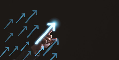 Businessman touching rise up white arrow for business and profit growth concept.