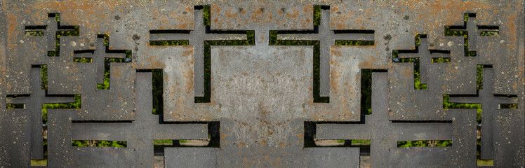 Religious background banner panorama - Old weathered metal fence with cross shape symbol on cemetery