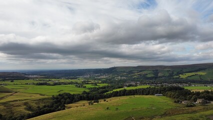 Aerial view of rural farmland with fields and grassland. Taken in Lancashire England. 