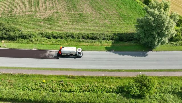 Road Resurfacing Aerial View of Surface Dressing Micro Asphalt Process