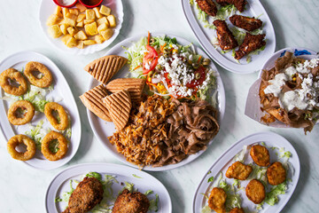 Top view of variety of Pakistani fast food dishes