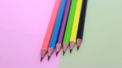color pencils on a white background