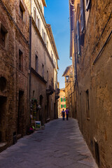 Pienza, Italy,  15 April 2022: medieval street in the center
