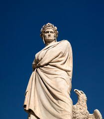 Marble statue of Dante Alighieri at the Santa Croce Square, Florence, Italy