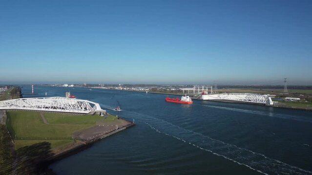 Aerial top down photo Maeslantkering storm surge barrier on the Nieuwe Waterweg Netherlands it closes if the city of Rotterdam is threatened by floods and is one of largest moving structures on earth