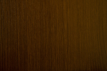 Naklejka premium Dark brown wooden background