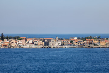Fototapeta na wymiar Cityscape of Messina, Sicily Italy seen from the water 