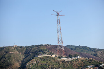 The eastern Pylon of Messina on the shores of the Strait of Messina on the southern coast of Italy