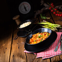 colorful turkey fricassee with asparagus and paprika