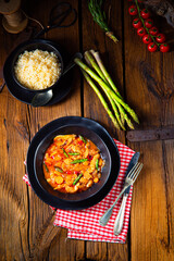 colorful turkey fricassee with asparagus and paprika